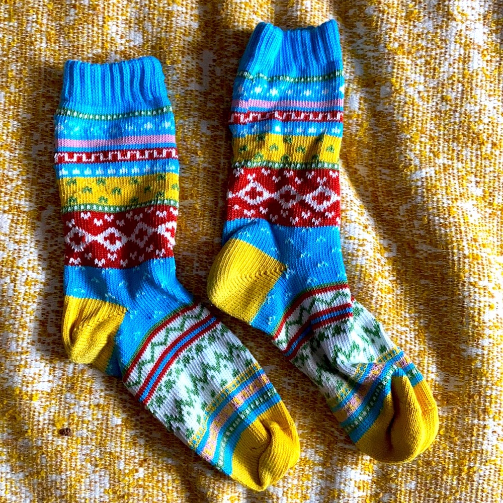 Fun calf socks! Thicker sweater material and nice colors/stitching. Never worn!